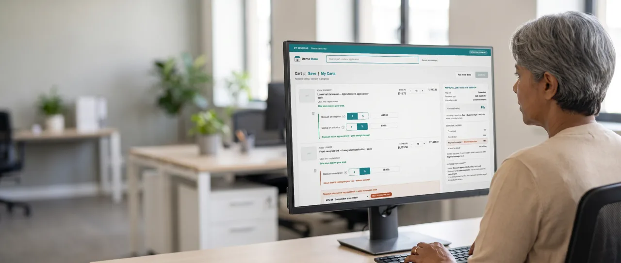 Manager with short grey hair and a beige cardigan at a monitor; the screen shows the rep's cart with one line's discount above the limit.