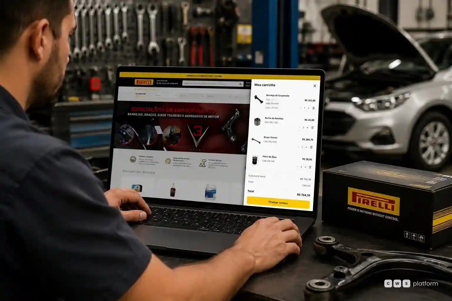 A mechanic reviews the Pirelli Conecta portal cart with parts and prices on a laptop in a workshop